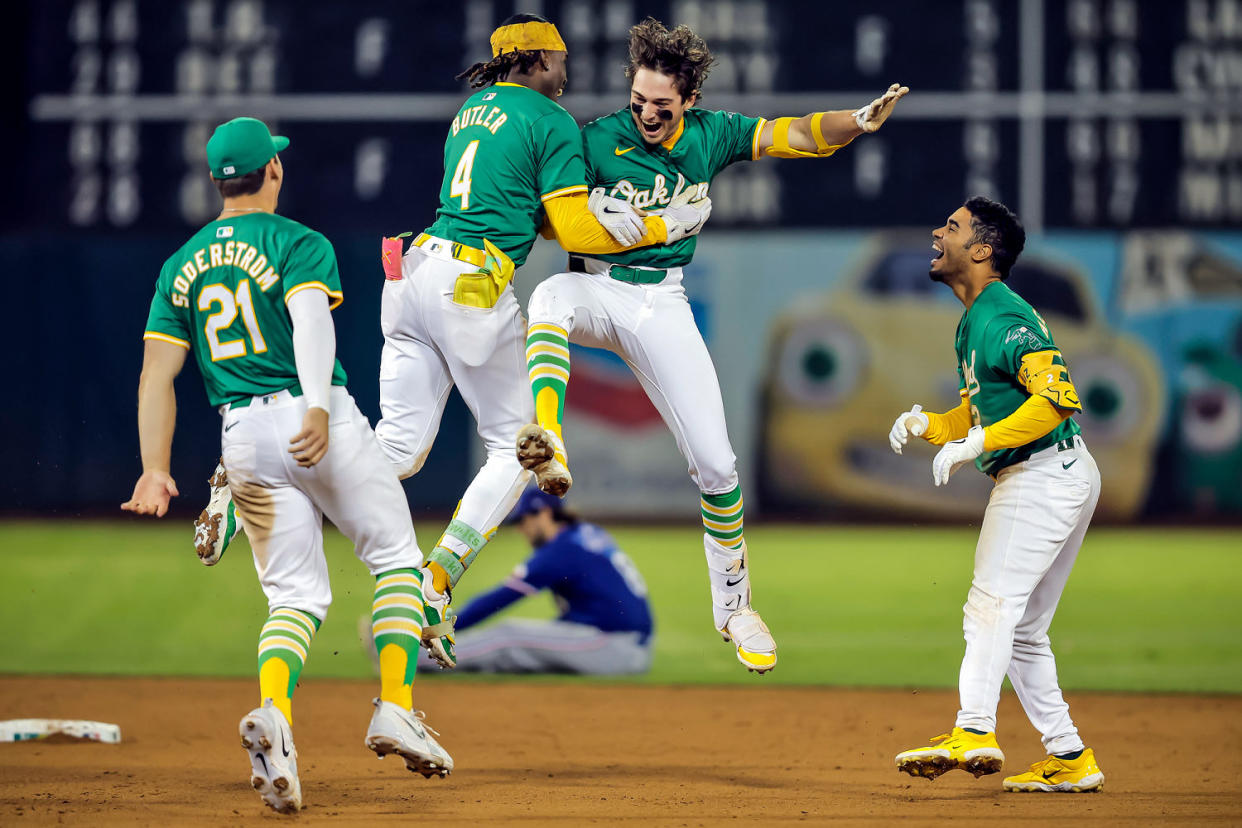 Oakland Athletics players celebrate on the field (Carlos Avila Gonzalez / San Francisco Chronicle via Getty Images file)