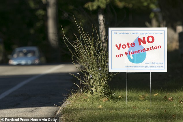 There has been controversy over fluoride in the water supply for years, with hundreds of communities voting against its use (Above is a campaign sign from Kennebunk, Maine)