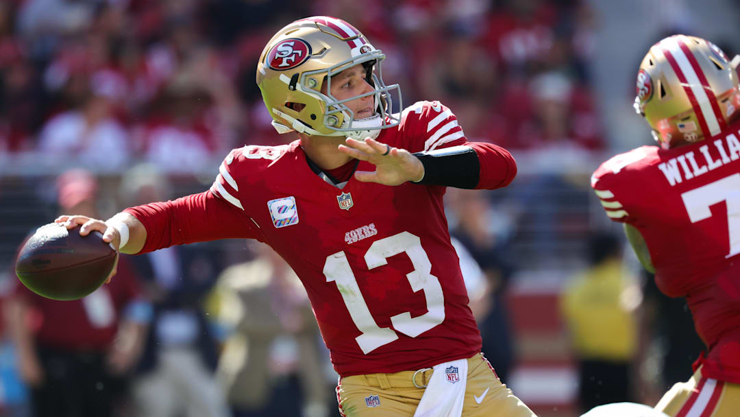 Sep 29, 2024; Santa Clara, California, USA; San Francisco 49ers quarterback Brock Purdy (13) throws a pass against the New England Patriots during the third quarter at Levi's Stadium. Mandatory Credit: Sergio Estrada-Imagn Images