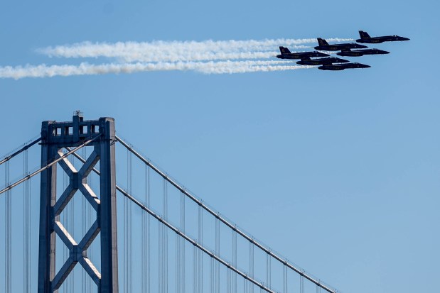 The U.S. Navy Blue Angels fly over the San Francisco-Oakland Bay Bridge as part of the annual Fleet Week, as seen from Treasure Island in San Francisco, Calif., on Friday, Oct. 11, 2024. The air show and other attractions continue on Oct. 12 and 13. (Ray Chavez/Bay Area News Group)