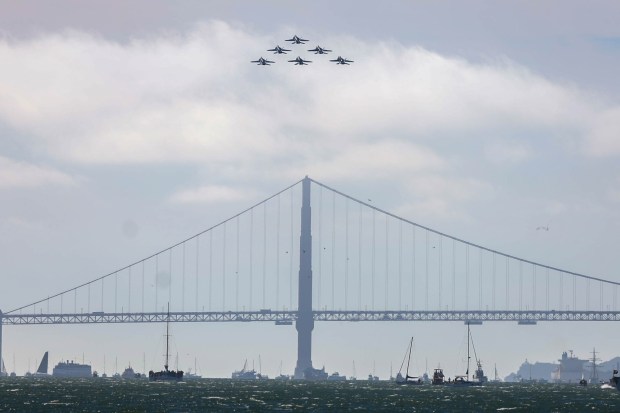 The U.S. Navy Blue Angels fly in formation over the Golden Gate Bridge as part of the annual Fleet Week, as seen from Treasure Island in San Francisco, Calif., on Friday, Oct. 11, 2024. The air show and other attractions continue on Oct. 12 and 13. (Ray Chavez/Bay Area News Group)