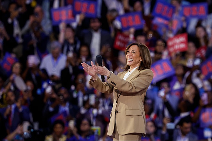 Democratic presidential candidate, US vice-president Kamala Harris speaks onstage during the first day of the Democratic National Convention at the United Center