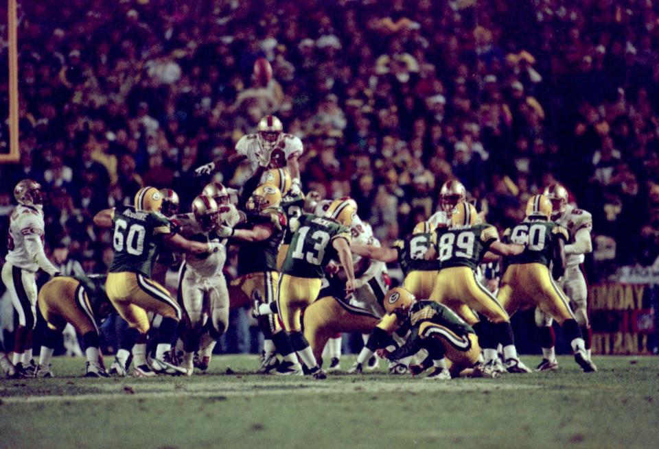 Chris Jacke connects on a 53-yard field goal in overtime to beat the San Francisco 49ers in 1996.