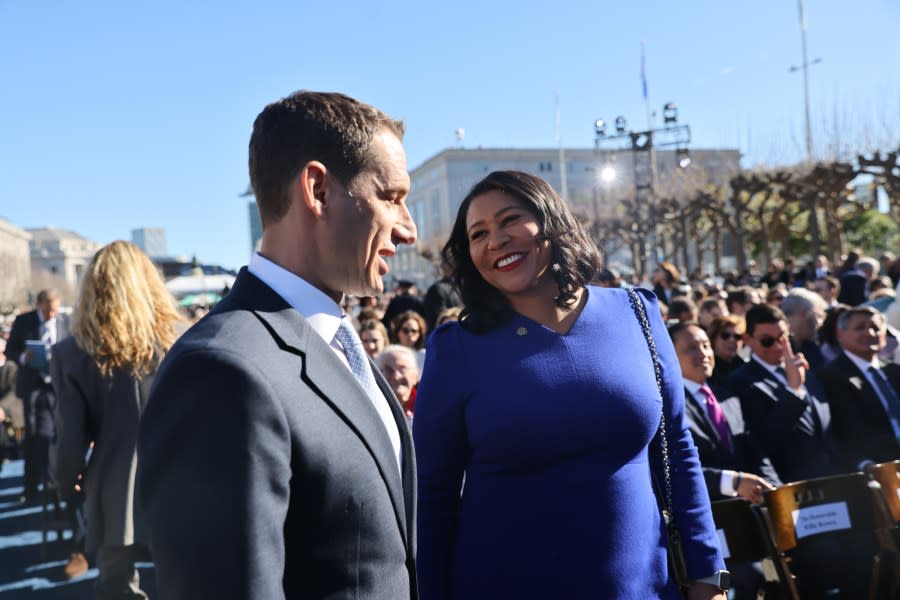 Daniel Lurie talks with outgoing mayor London Breed before his inauguration in San Francisco on Wednesday, January 8, 2025. (Photo by Gabrielle Lurie/San Francisco Chronicle via Getty Images)