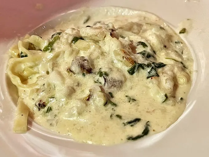 Crab meets garlic in a cheesy tango! This Alfredo fondue is the ultimate comfort food, proving that sometimes, more really is more.